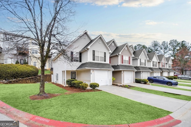 view of front facade featuring a shingled roof, a front lawn, a residential view, a garage, and driveway