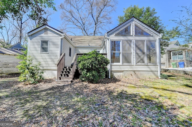 exterior space with a sunroom