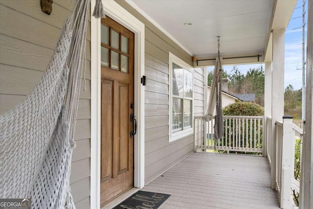 wooden deck featuring a porch