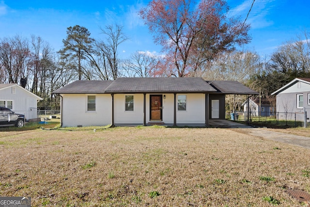 ranch-style house with driveway, a front lawn, a carport, fence, and brick siding
