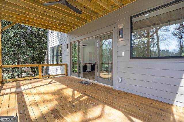 wooden terrace with ceiling fan