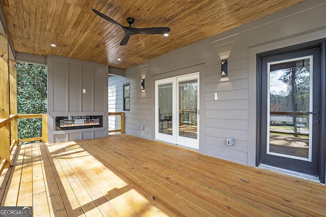 wooden terrace with ceiling fan