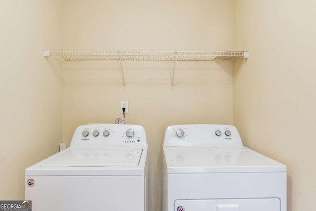 laundry area featuring laundry area and washing machine and clothes dryer