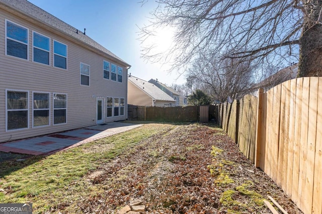 view of yard featuring a fenced backyard