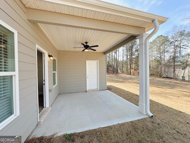 view of patio featuring ceiling fan