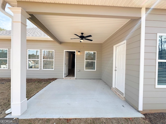 view of patio featuring ceiling fan