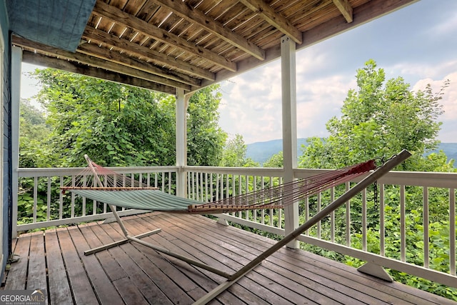 wooden terrace with a mountain view