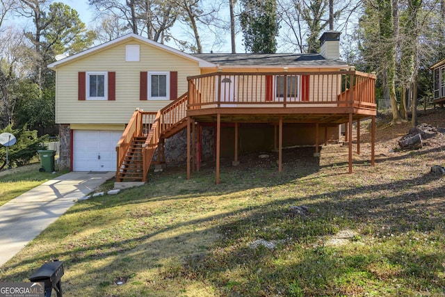 view of front of home featuring stairs, concrete driveway, a front yard, an attached garage, and a chimney