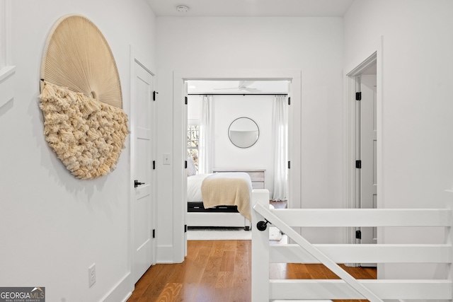 bedroom featuring wood finished floors