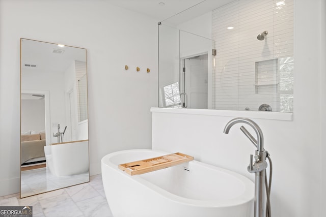 ensuite bathroom with ensuite bath, a shower stall, visible vents, and marble finish floor