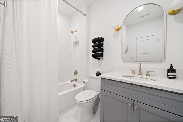 full bathroom featuring visible vents, toilet, marble finish floor, shower / bath combo, and vanity