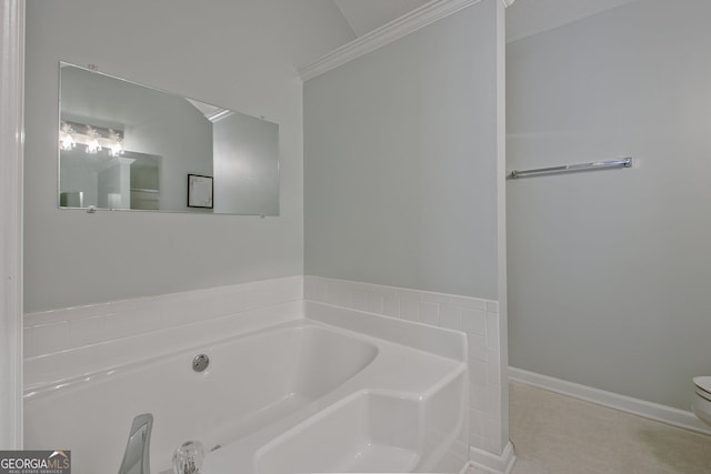 bathroom with toilet, a bath, baseboards, and ornamental molding