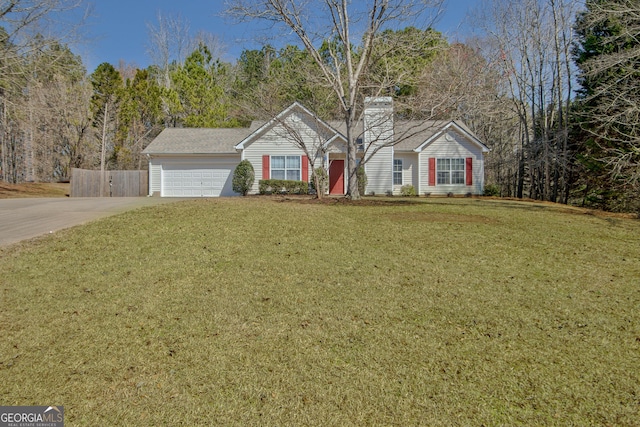 single story home with a garage, a front lawn, driveway, and fence