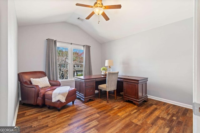 office space featuring dark wood-style floors, visible vents, ceiling fan, and vaulted ceiling