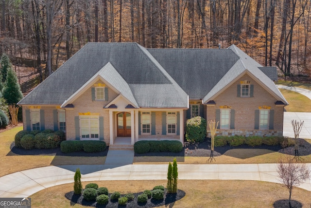 view of front of home with brick siding