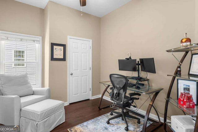 office area with ceiling fan, baseboards, and wood finished floors