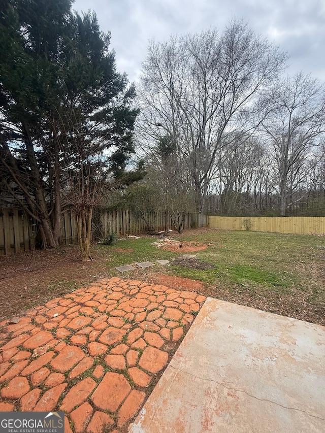 view of patio / terrace featuring fence private yard