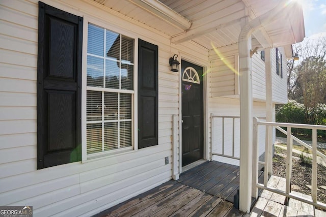 doorway to property with a porch