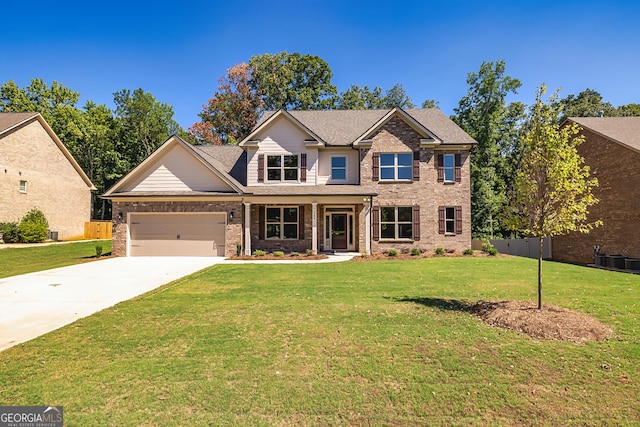 view of front of house featuring a front lawn, fence, concrete driveway, a garage, and brick siding