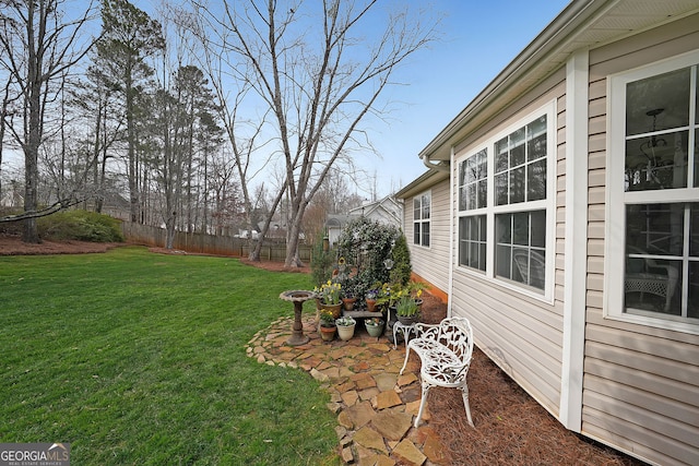 view of yard with fence