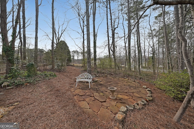 view of yard with a fire pit