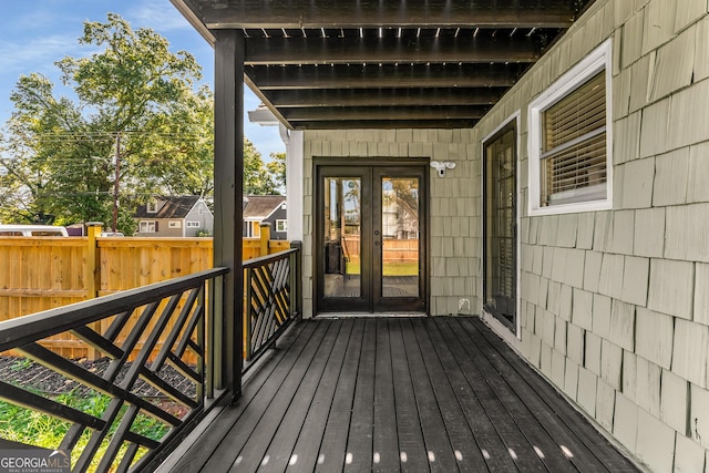 wooden deck with french doors and fence