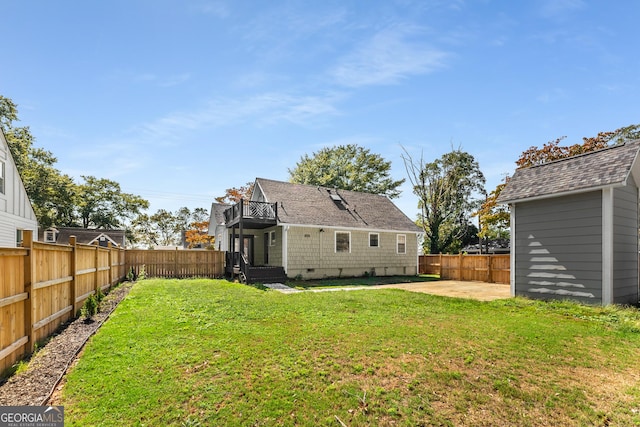 back of house featuring a shingled roof, a patio area, a fenced backyard, a yard, and crawl space