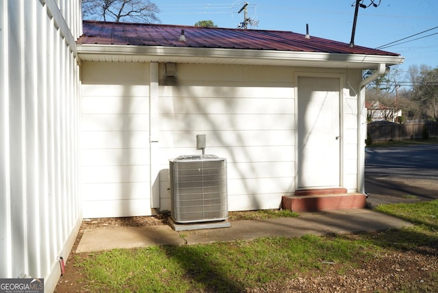 view of outbuilding featuring central AC unit