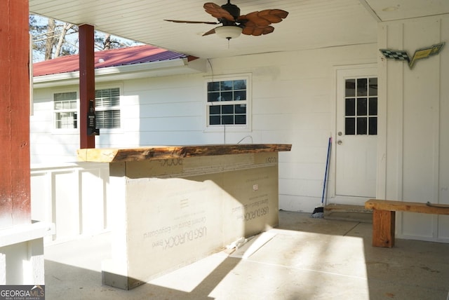 view of patio featuring a ceiling fan