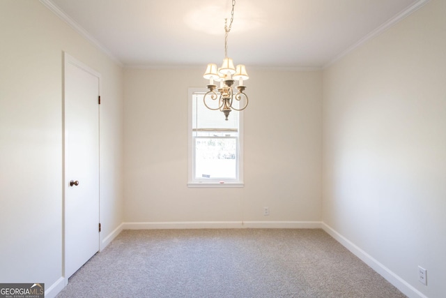 spare room with baseboards, carpet floors, an inviting chandelier, and crown molding