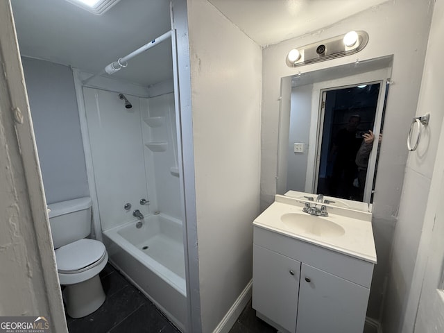 bathroom featuring tile patterned floors, toilet, and vanity