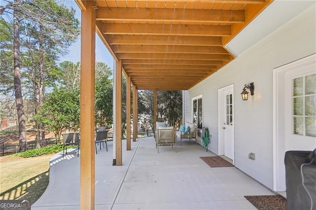 view of patio / terrace with fence