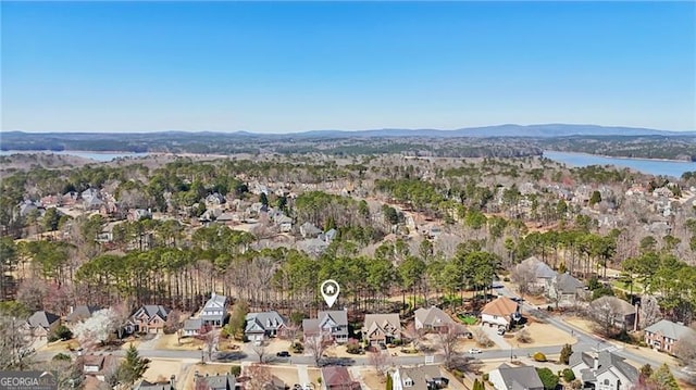 aerial view featuring a residential view and a water view