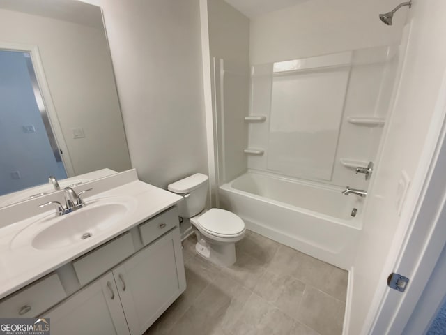 bathroom with vanity, toilet, and shower / bathtub combination