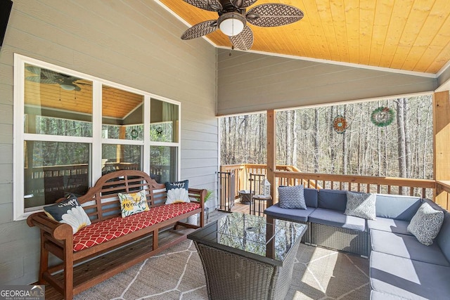 exterior space featuring ceiling fan, wooden ceiling, and lofted ceiling