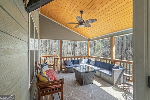 view of patio featuring an outdoor hangout area and a ceiling fan