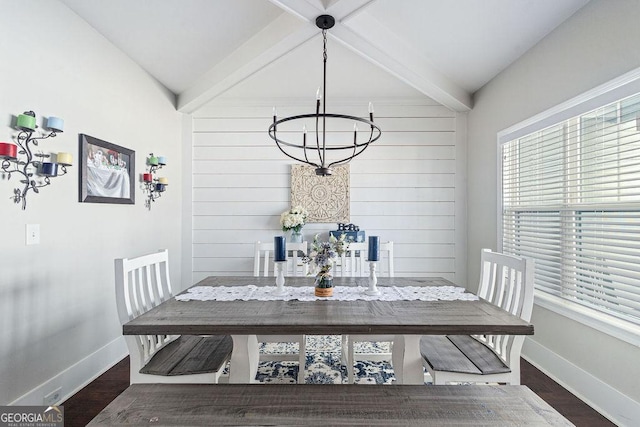 dining area with beamed ceiling, baseboards, and dark wood-style flooring