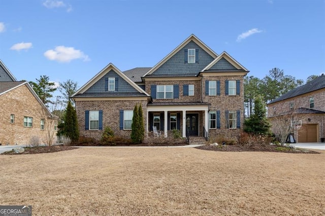 view of front of house featuring brick siding