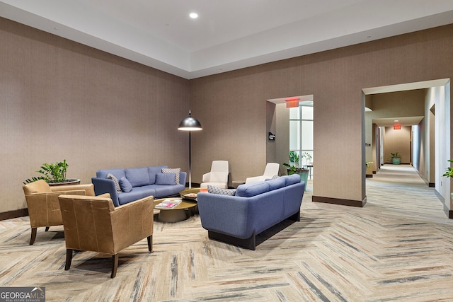 living room with recessed lighting and baseboards