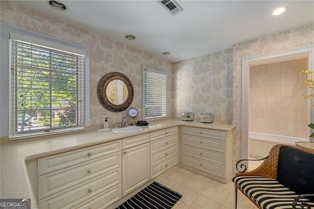 bathroom featuring recessed lighting, visible vents, vanity, and tile patterned flooring