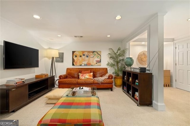 living room with recessed lighting, visible vents, carpet floors, and crown molding