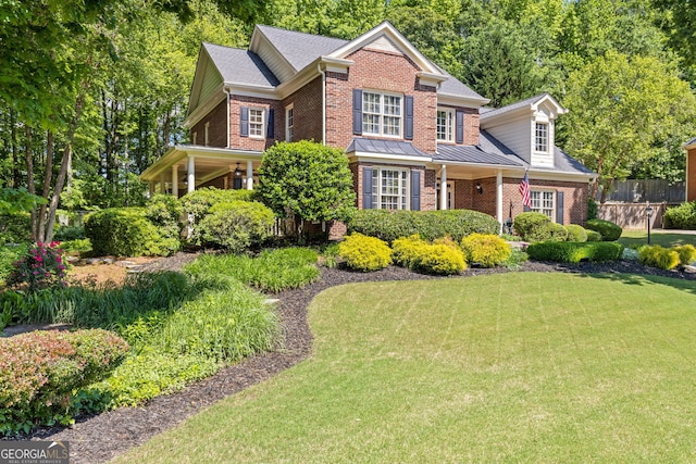 view of front of house featuring brick siding