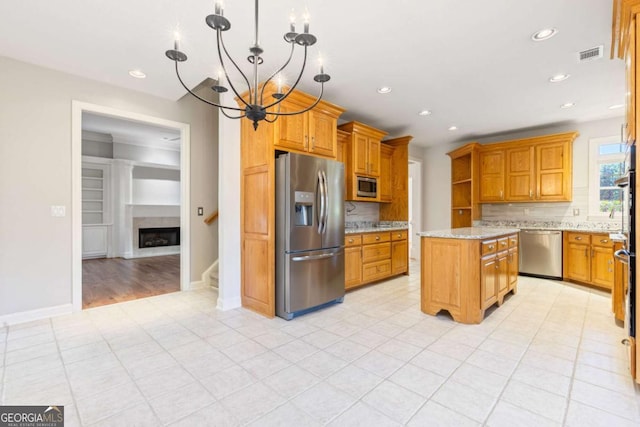 kitchen featuring open shelves, stainless steel appliances, decorative backsplash, light stone countertops, and a chandelier