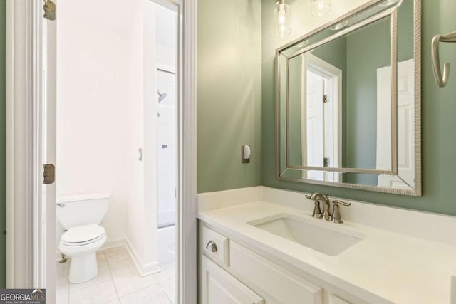 full bathroom featuring vanity, tile patterned floors, toilet, and walk in shower