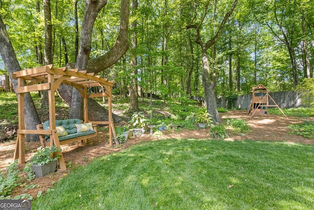 view of yard featuring a playground