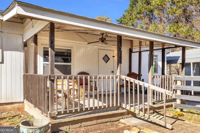 doorway to property featuring a ceiling fan