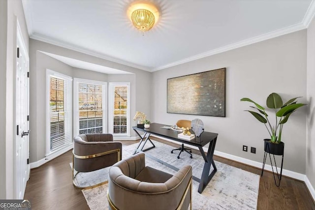 office with baseboards, wood finished floors, and crown molding