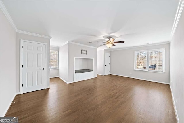 unfurnished living room with crown molding, dark wood-style flooring, a wealth of natural light, and ceiling fan