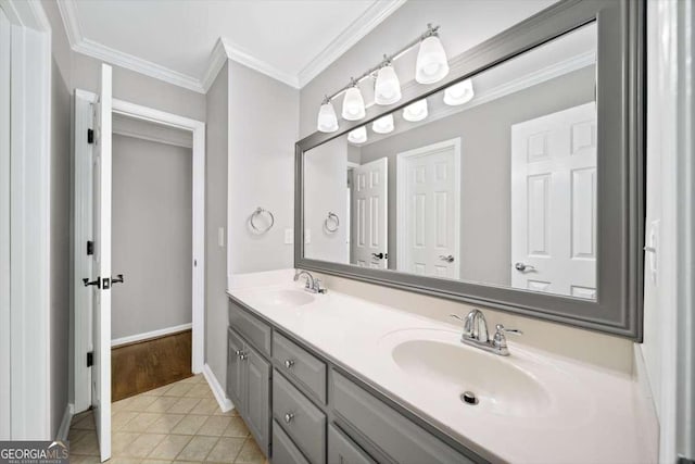 bathroom featuring a sink, double vanity, ornamental molding, and tile patterned floors