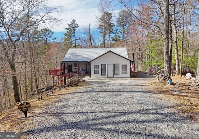 106 Opaque Way, Ellijay, GA 30540 - view of front of property featuring gravel driveway and a metal roof